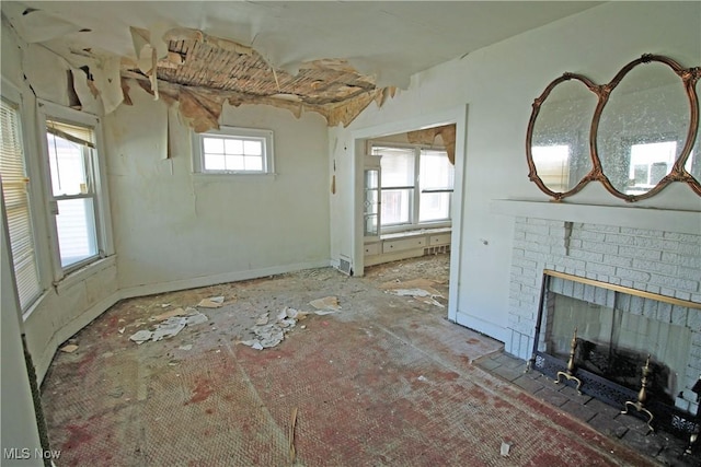 4076 E 106th St, Cleveland, OH 44105 - unfurnished living room with a brick fireplace