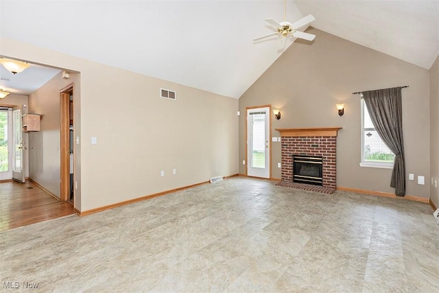 3840 Dartford Ln, Medina, OH 44256 - unfurnished living room featuring high vaulted ceiling, healthy amount of natural light, ceiling fan, a brick fireplace, and baseboards