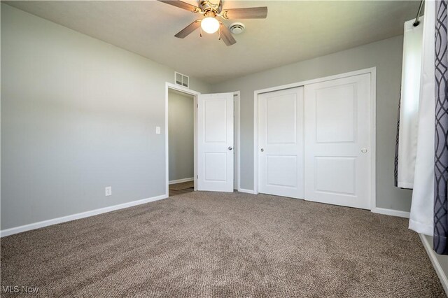 117 N Navarre Ave, Youngstown, OH 44515 - unfurnished bedroom featuring carpet flooring, baseboards, a closet, and ceiling fan