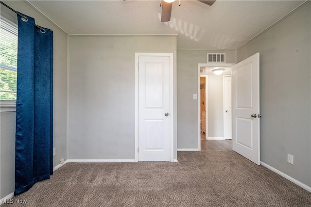 117 N Navarre Ave, Youngstown, OH 44515 - unfurnished bedroom featuring carpet floors, a ceiling fan, and baseboards