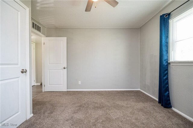 117 N Navarre Ave, Youngstown, OH 44515 - unfurnished room featuring carpet, ceiling fan, and baseboards