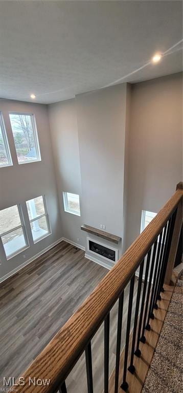 9145 Ledge View Ter, Broadview Heights, OH 44147 - stairs featuring wood finished floors, recessed lighting, and baseboards