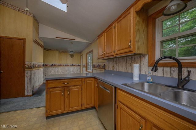 5286 Egypt Rd, Smithville, OH 44677 - kitchen featuring stainless steel dishwasher, a sink, plenty of natural light, lofted ceiling, and light floors