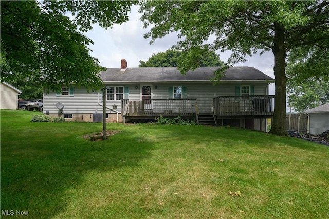 5286 Egypt Rd, Smithville, OH 44677 - rear view of house with a wooden deck, a yard, a chimney, and central air condition unit