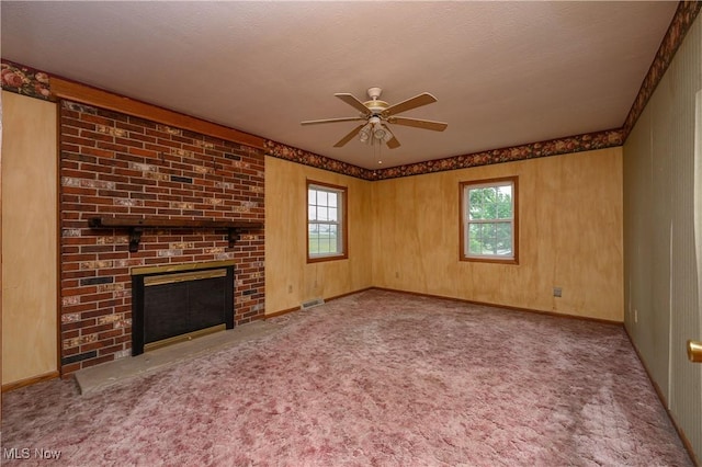 5286 Egypt Rd, Smithville, OH 44677 - unfurnished living room featuring ceiling fan, a fireplace, carpet, and baseboards