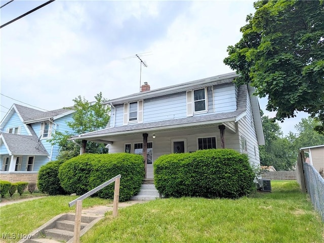 623 Cole Ave, Akron, OH 44301 - view of front of house featuring a chimney and central AC