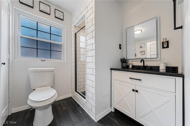 17314 Lomond Blvd, Shaker Heights, OH 44120 - bathroom with a shower stall, wood finished floors, and vanity