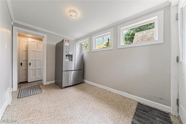 17314 Lomond Blvd, Shaker Heights, OH 44120 - kitchen featuring stainless steel refrigerator with ice dispenser, crown molding, healthy amount of natural light, and dark aggregate flooring