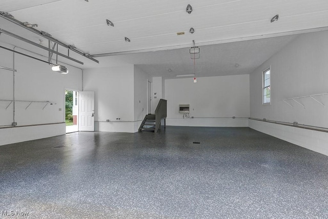 8000 Lake Rd, Seville, OH 44273 - garage with a garage door opener and heating unit