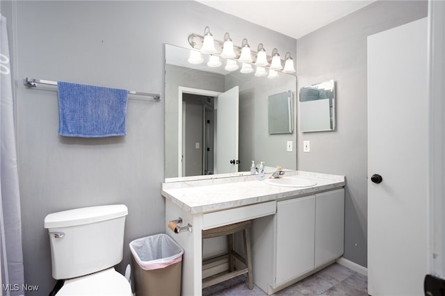 28140 Detroit Rd Unit D3, Westlake, OH 44145 - bathroom featuring vanity, toilet, and baseboards