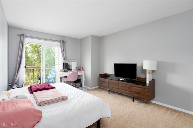 28140 Detroit Rd Unit D3, Westlake, OH 44145 - bedroom with carpet, an office area, baseboards, and access to outside