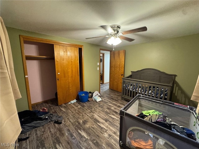 85 Arrow Rd NW, Carrollton, OH 44615 - bedroom featuring wood finished floors, a closet, and a ceiling fan