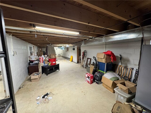 85 Arrow Rd NW, Carrollton, OH 44615 - unfinished basement featuring concrete block wall