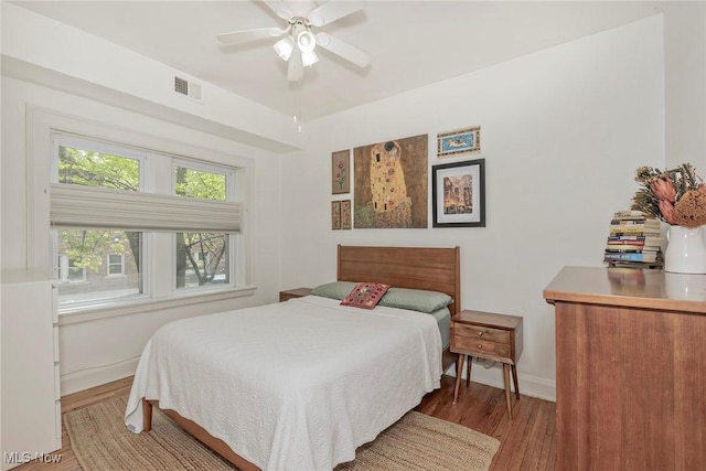 2725 Hampshire Rd Unit 2, Cleveland Heights, OH 44106 - bedroom featuring wood finished floors, baseboards, and a ceiling fan