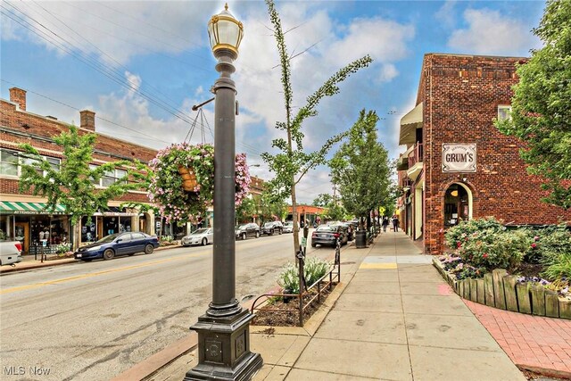 2725 Hampshire Rd Unit 2, Cleveland Heights, OH 44106 - view of asphalt road with sidewalks, street lighting, and curbs