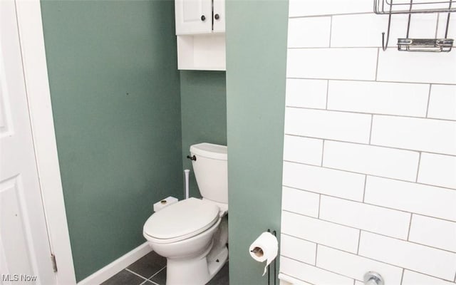 166 N Turner Rd, Youngstown, OH 44515 - bathroom with tile patterned floors, toilet, and baseboards