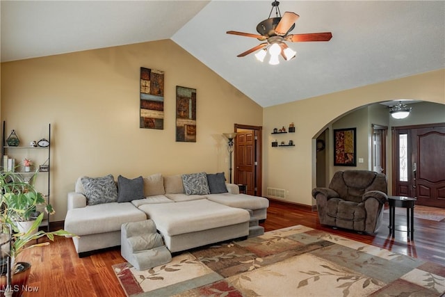 471 Buck Run, Pennsboro, WV 26415 - living area featuring arched walkways, a ceiling fan, wood finished floors, baseboards, and high vaulted ceiling