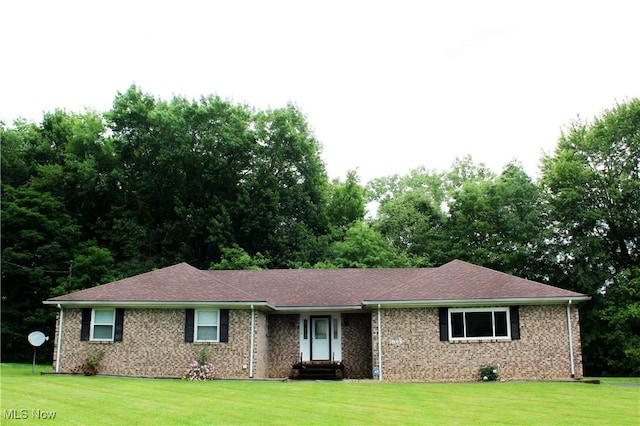 3845 Hightree Ave SE, Warren, OH 44484 - ranch-style house featuring a front lawn and brick siding