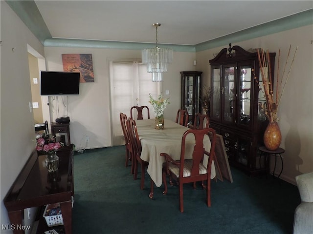 14610 Onaway Rd, Shaker Heights, OH 44120 - carpeted dining room with a chandelier