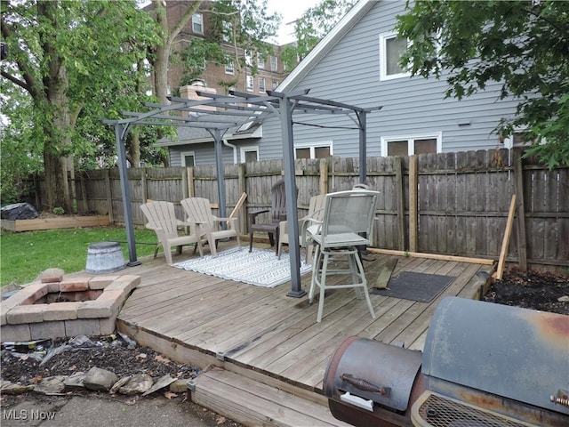 14610 Onaway Rd, Shaker Heights, OH 44120 - wooden deck featuring a fire pit, a pergola, and a fenced backyard