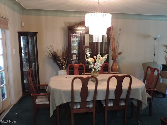 14610 Onaway Rd, Shaker Heights, OH 44120 - carpeted dining room with a chandelier