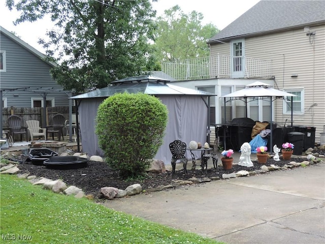 14610 Onaway Rd, Shaker Heights, OH 44120 - back of property featuring a gazebo, a patio, and an outdoor structure