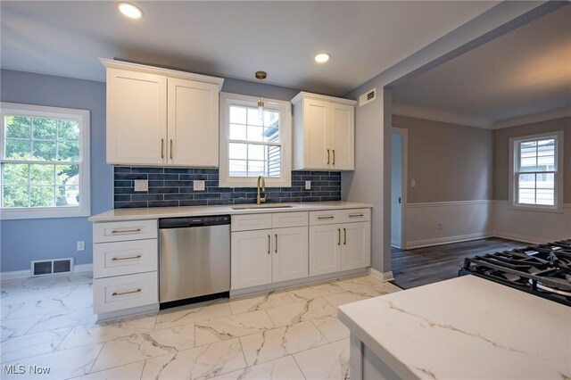 17607 Scottsdale Blvd, Shaker Heights, OH 44120 - kitchen with stainless steel dishwasher, a sink, plenty of natural light, and recessed lighting