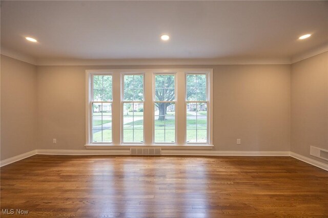 17607 Scottsdale Blvd, Shaker Heights, OH 44120 - spare room featuring crown molding, dark wood-style flooring, baseboards, and recessed lighting