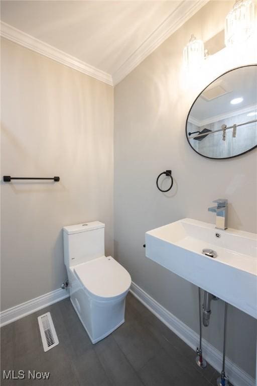 17607 Scottsdale Blvd, Shaker Heights, OH 44120 - half bath with crown molding, toilet, and baseboards