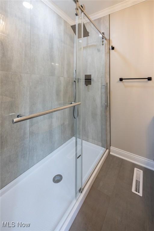 17607 Scottsdale Blvd, Shaker Heights, OH 44120 - full bath featuring ornamental molding, a stall shower, and baseboards