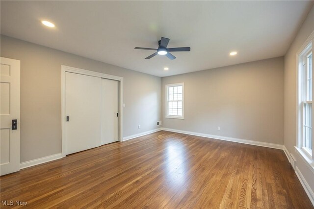 17607 Scottsdale Blvd, Shaker Heights, OH 44120 - unfurnished bedroom with wood finished floors, baseboards, recessed lighting, a ceiling fan, and a closet