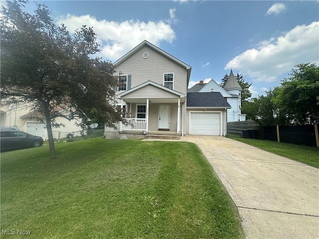 4322 Coleman Ave, Ashtabula, OH 44004 - traditional home with driveway, a porch, and an attached garage