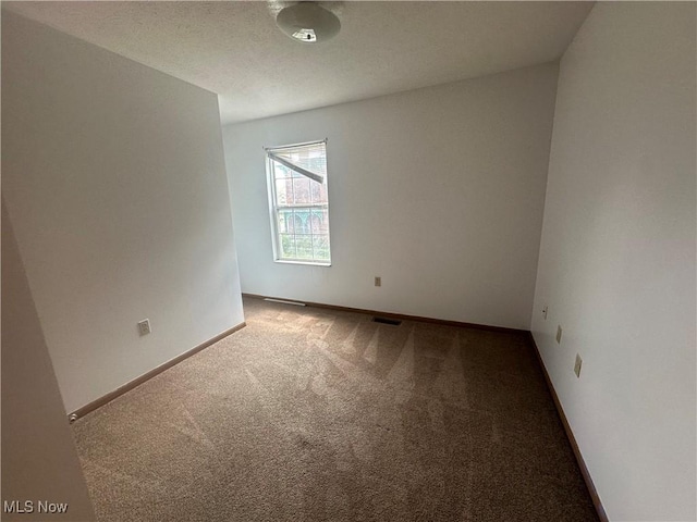 4322 Coleman Ave, Ashtabula, OH 44004 - carpeted empty room featuring baseboards