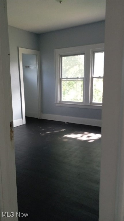 11705 Fairport Ave, Cleveland, OH 44108 - empty room with baseboards