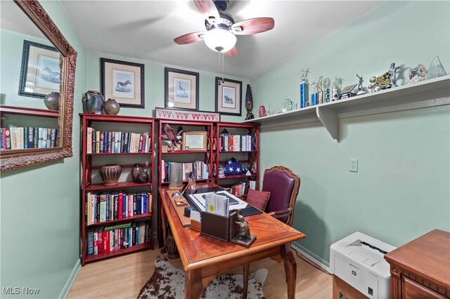 18975 Van Aken Blvd Unit 401, Shaker Heights, OH 44122 - home office with wood finished floors, a ceiling fan, and baseboards