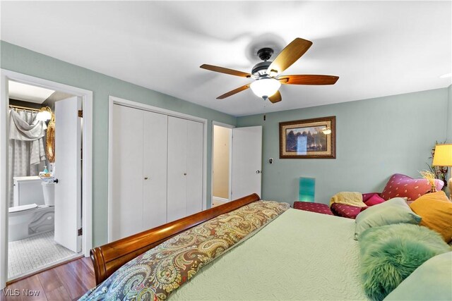 18975 Van Aken Blvd Unit 401, Shaker Heights, OH 44122 - bedroom with a closet, wood finished floors, connected bathroom, and a ceiling fan