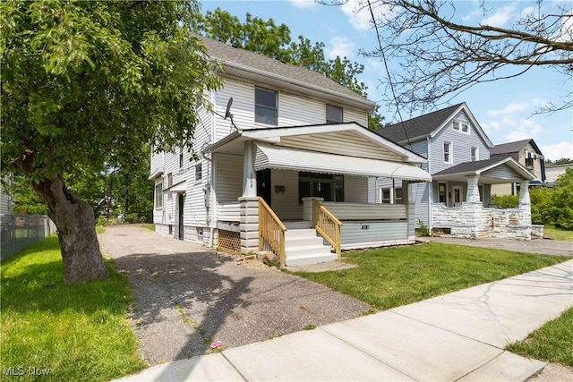 3338 E 130th St, Cleveland, OH 44120 - american foursquare style home with covered porch and driveway
