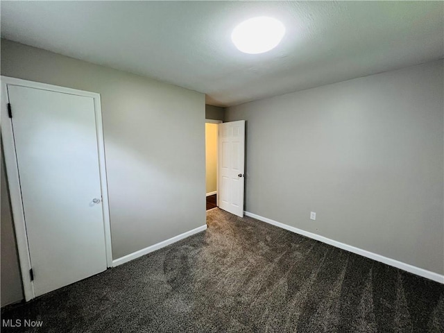 4780 E 173rd St, Cleveland, OH 44128 - unfurnished bedroom featuring carpet floors and baseboards