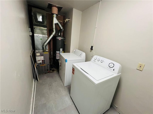 4780 E 173rd St, Cleveland, OH 44128 - laundry room featuring washer and clothes dryer and water heater