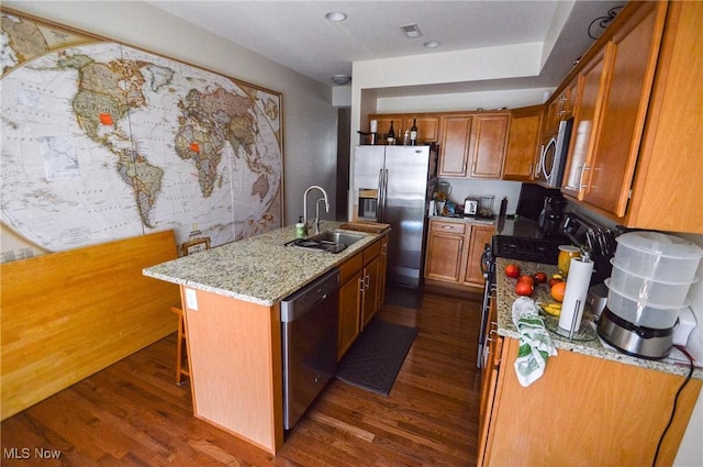 1425 Lindazzo Ave, Cleveland, OH 44114 - kitchen featuring appliances with stainless steel finishes, a sink, dark wood-style floors, and brown cabinets