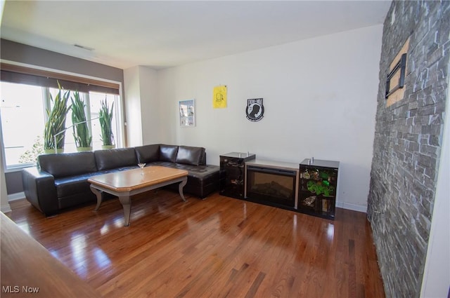 1425 Lindazzo Ave, Cleveland, OH 44114 - living area with wood finished floors and baseboards