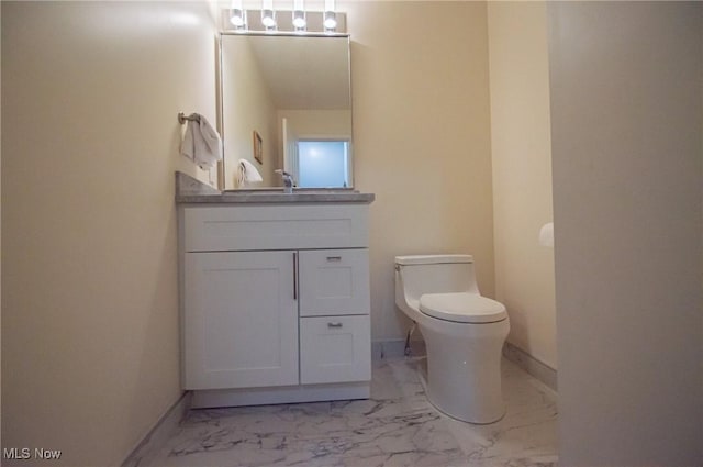 1425 Lindazzo Ave, Cleveland, OH 44114 - half bath featuring marble look tile flooring, toilet, and vanity