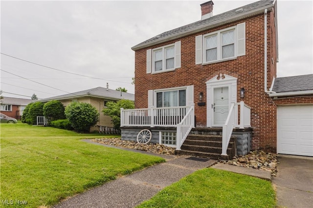 3804 Collins Way, Weirton, WV 26062 - colonial inspired home featuring brick siding, a chimney, a front yard, and roof with shingles