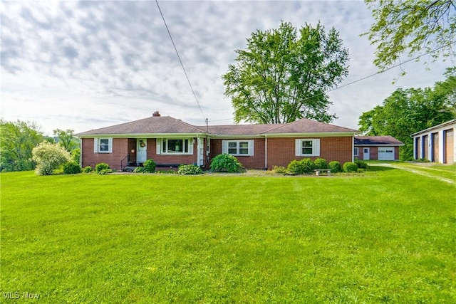 340 53rd St SW, Canton, OH 44706 - ranch-style home with brick siding, a front lawn, and a chimney