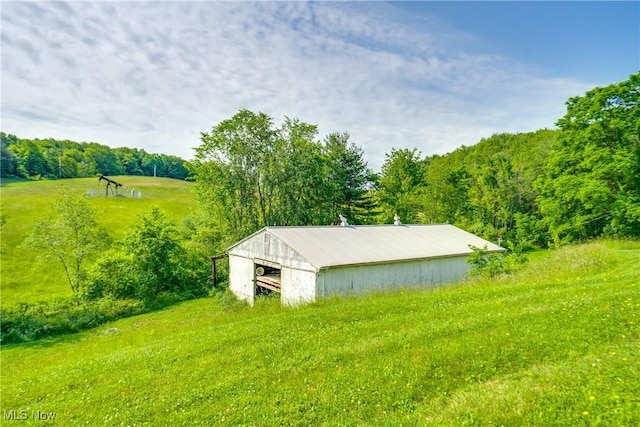 340 53rd St SW, Canton, OH 44706 - view of pole building featuring a view of trees