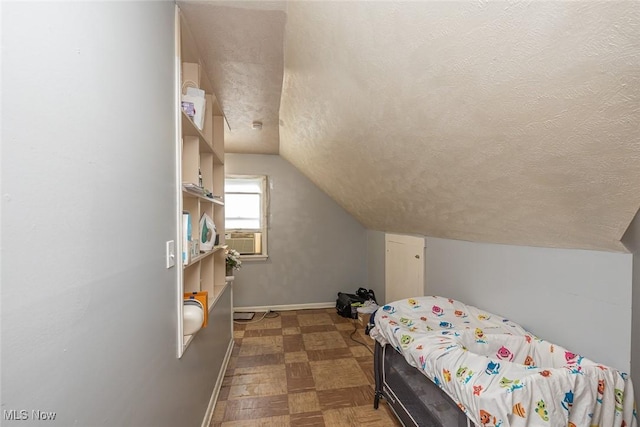 21202 Franklin Rd, Maple Heights, OH 44137 - bedroom with a textured ceiling, tile patterned floors, lofted ceiling, baseboards, and cooling unit