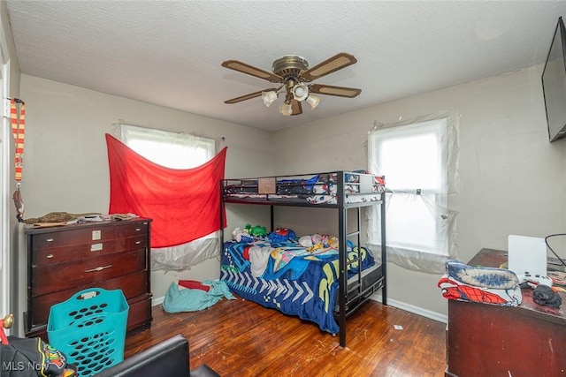 21202 Franklin Rd, Maple Heights, OH 44137 - bedroom featuring wood finished floors, baseboards, and ceiling fan
