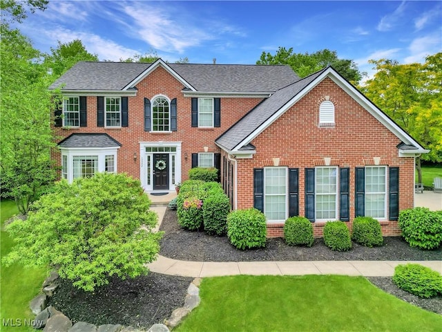 15532 Raya Oval, North Royalton, OH 44133 - colonial-style house featuring brick siding and roof with shingles