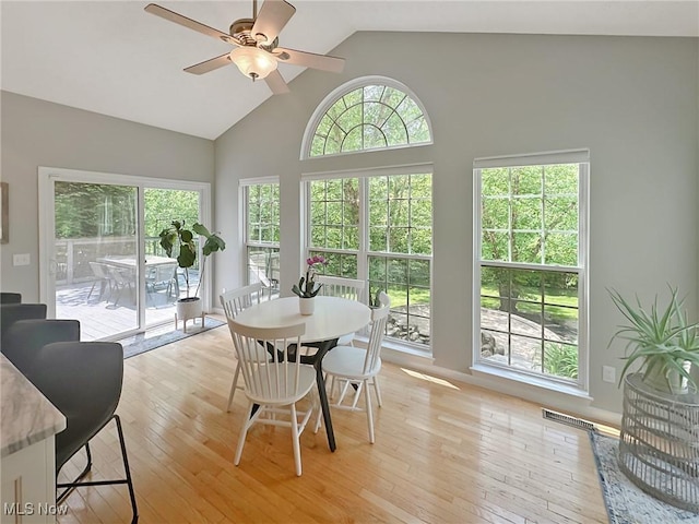 15532 Raya Oval, North Royalton, OH 44133 - dining space featuring a ceiling fan, light wood-style floors, and high vaulted ceiling
