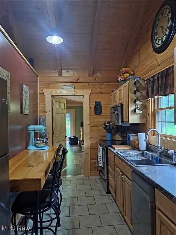 62158 Savage Rd, Cambridge, OH 43725 - kitchen featuring appliances with stainless steel finishes, a sink, wooden walls, wooden ceiling, and light tile patterned floors